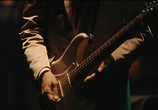 Сцена из фильма Tomoyasu Hotei - Guitar X Symphony (2012) Tomoyasu Hotei - Guitar X Symphony сцена 3